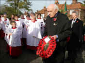 Councillor John Stretton  laid the first wreath