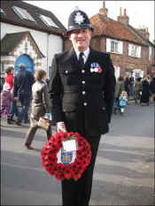 PC Valentine De Haan with the wreath for the Police